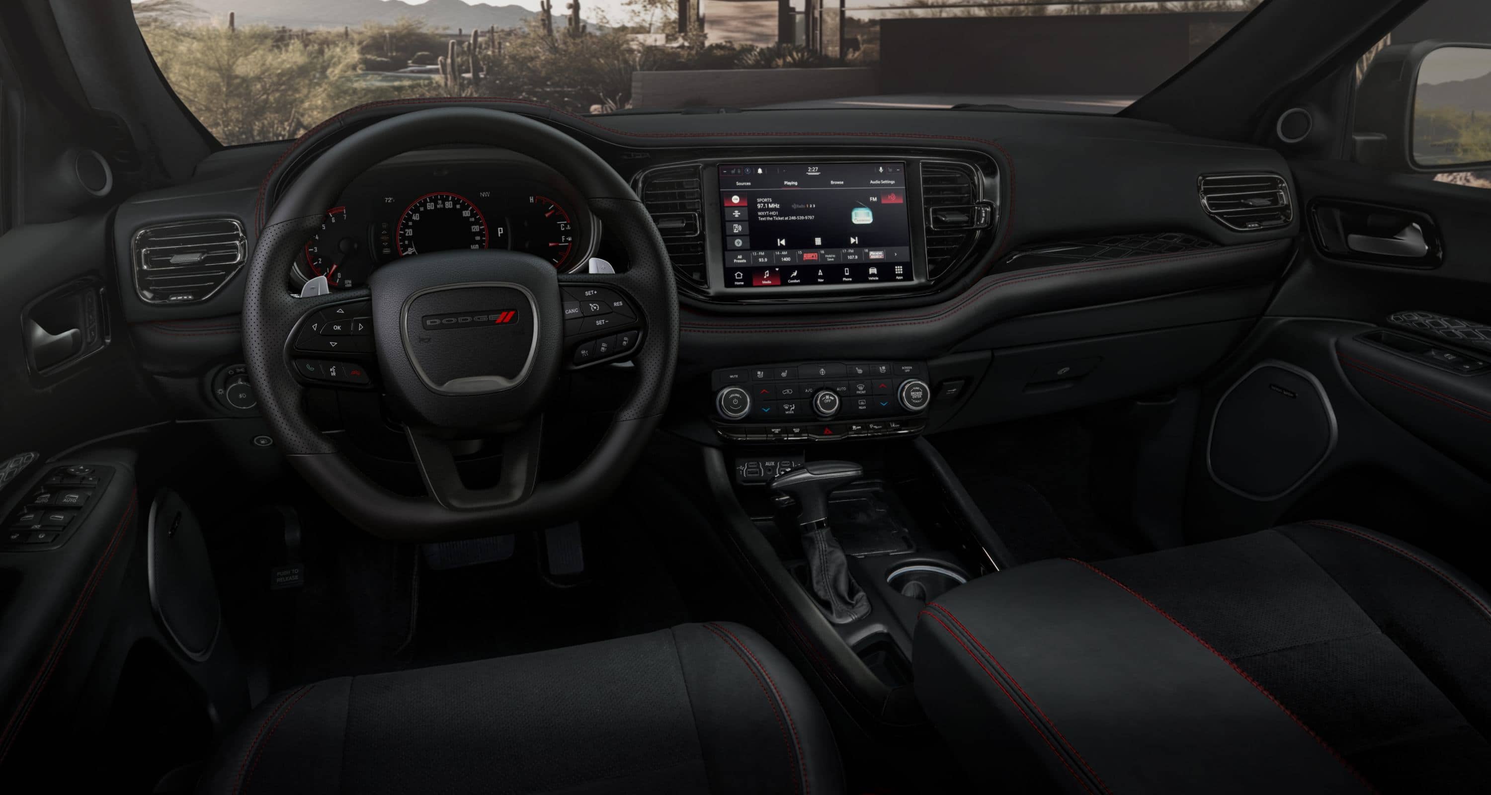 2026 Dodge Durango interior images: The steering wheel, Digital Cluster Display, Uconnect touchscreen and center stack controls in the 2026 Dodge Durango SRT Hellcat.