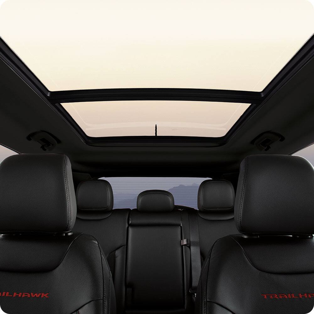 Panoramic sunroof and rear seats in a 2026 Jeep Compass.