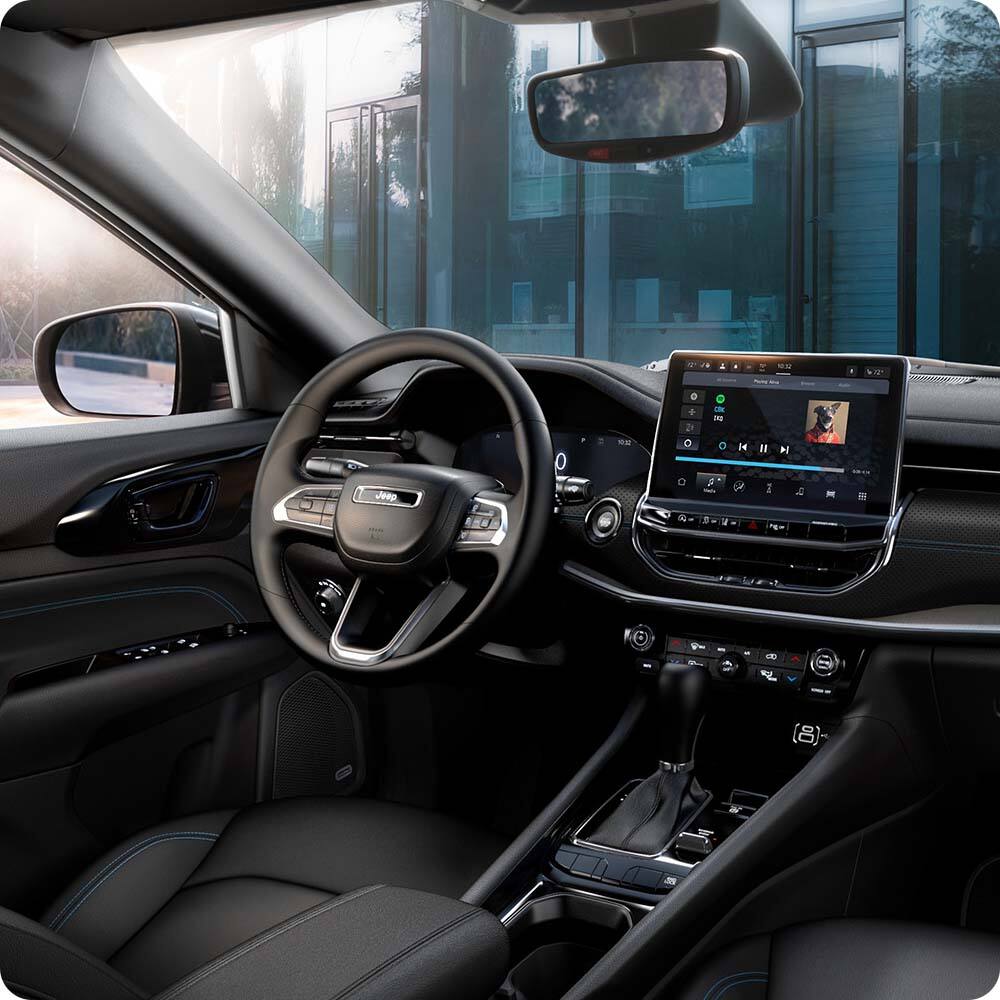 Steering wheel, digital instruments and center touchscreen in a 2026 Jeep Compass.