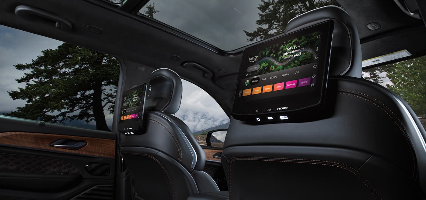 Rear-seat entertainment screens in a 2026 Jeep Grand Cherokee.