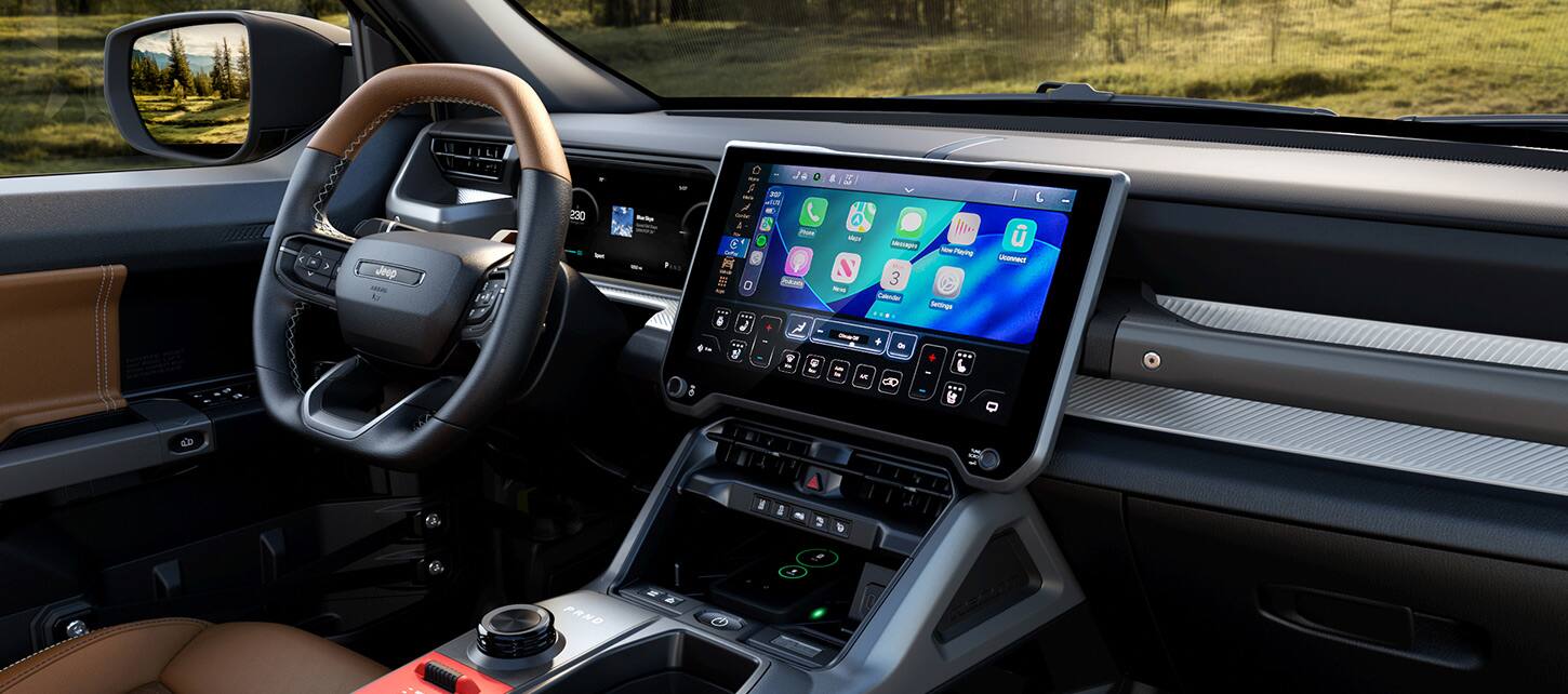 Steering wheel and central touchscreen in a 2026 Jeep Recon.