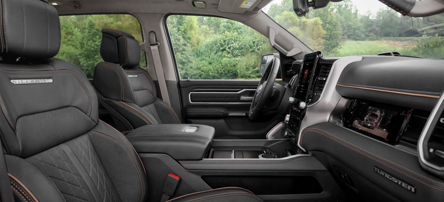 The front seats in the 2026 Ram 1500 Tungsten 4x4 Crew Cab.