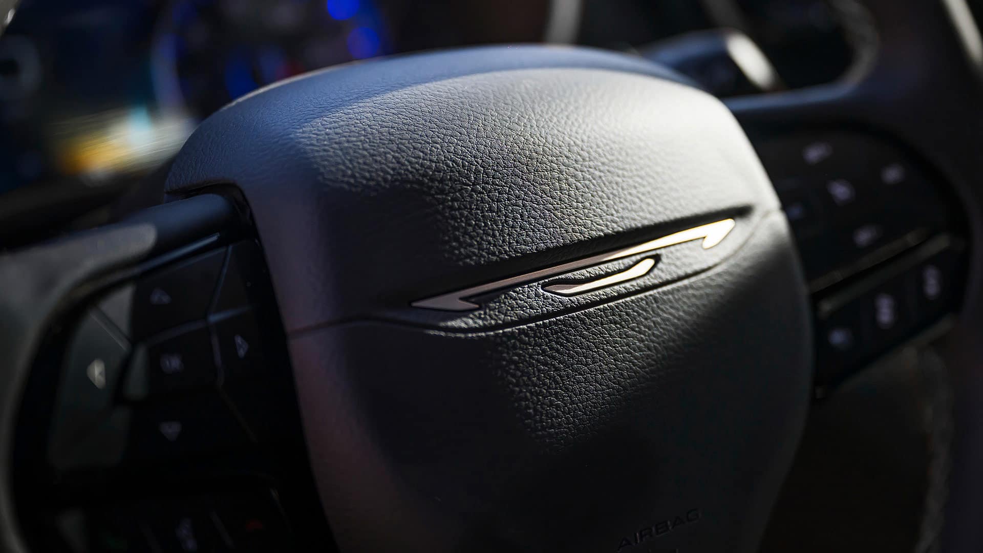 2027 Chrysler Pacifica steering wheel and Chrysler wing emblem