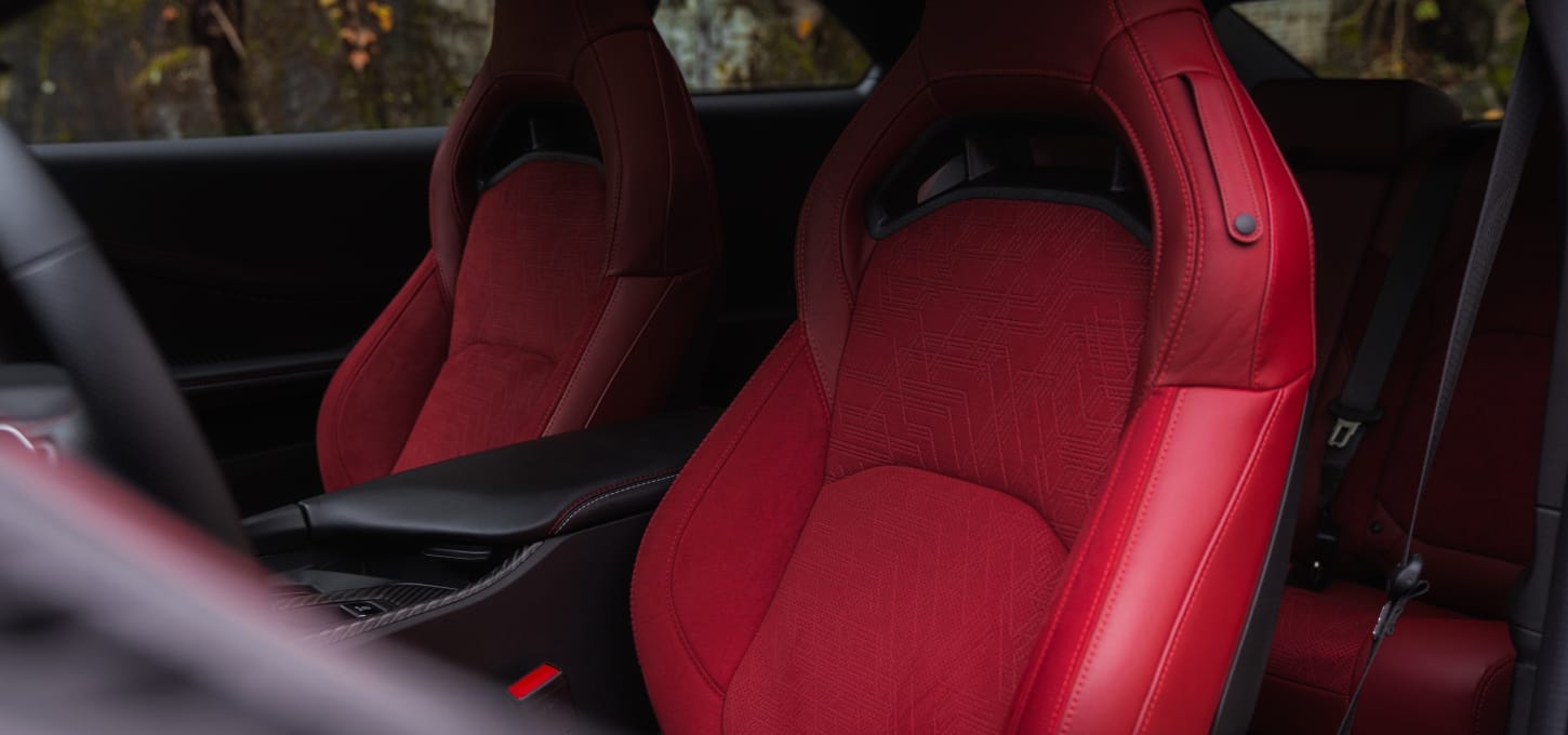 The red seats in a 2027 Dodge Charger Scat Pack.