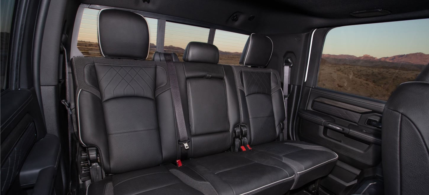 The 3-passenger rear bench seat in the 2027 Ram 2500 Heavy Duty Laramie Crew Cab pickup truck.