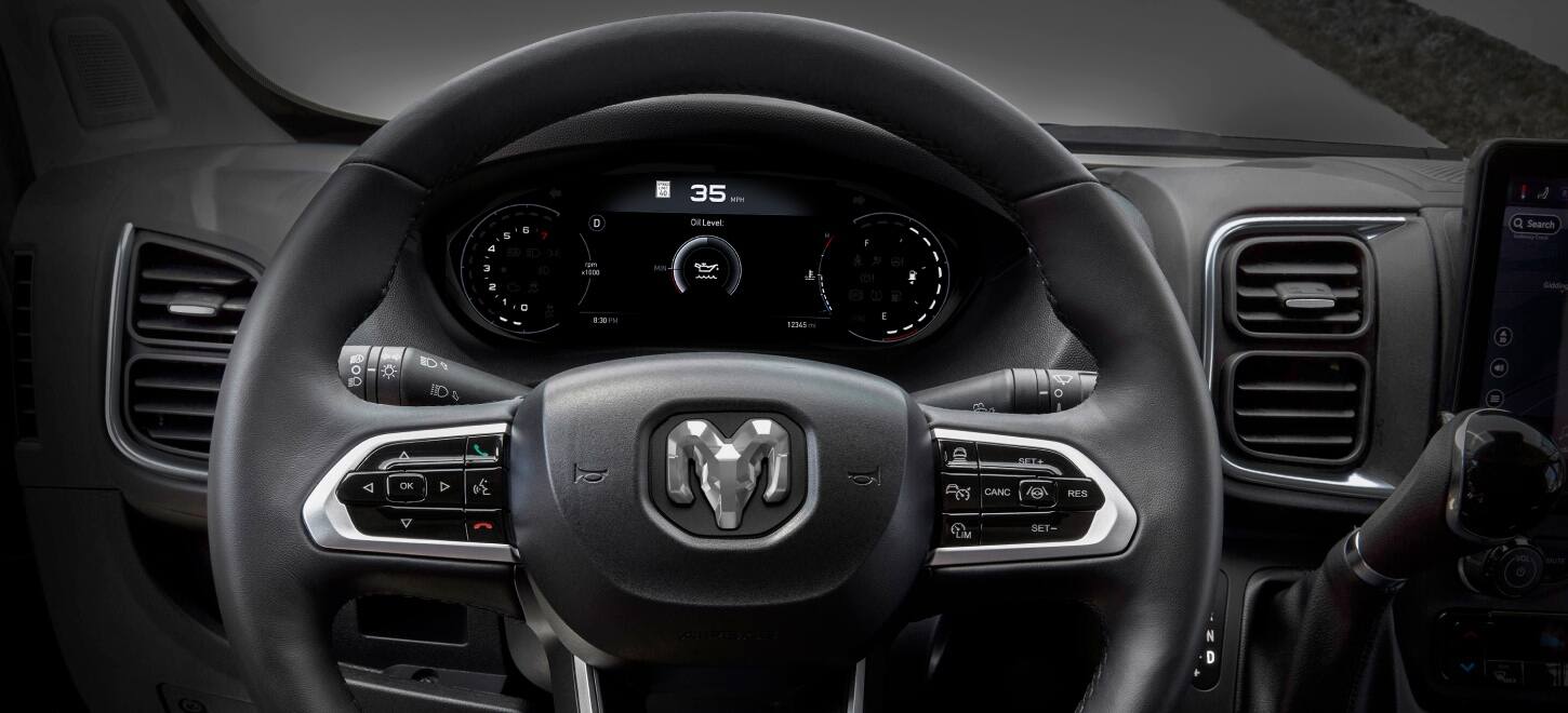 The steering wheel and Digital Cluster Display in the 2027 Ram ProMaster Cargo Van.